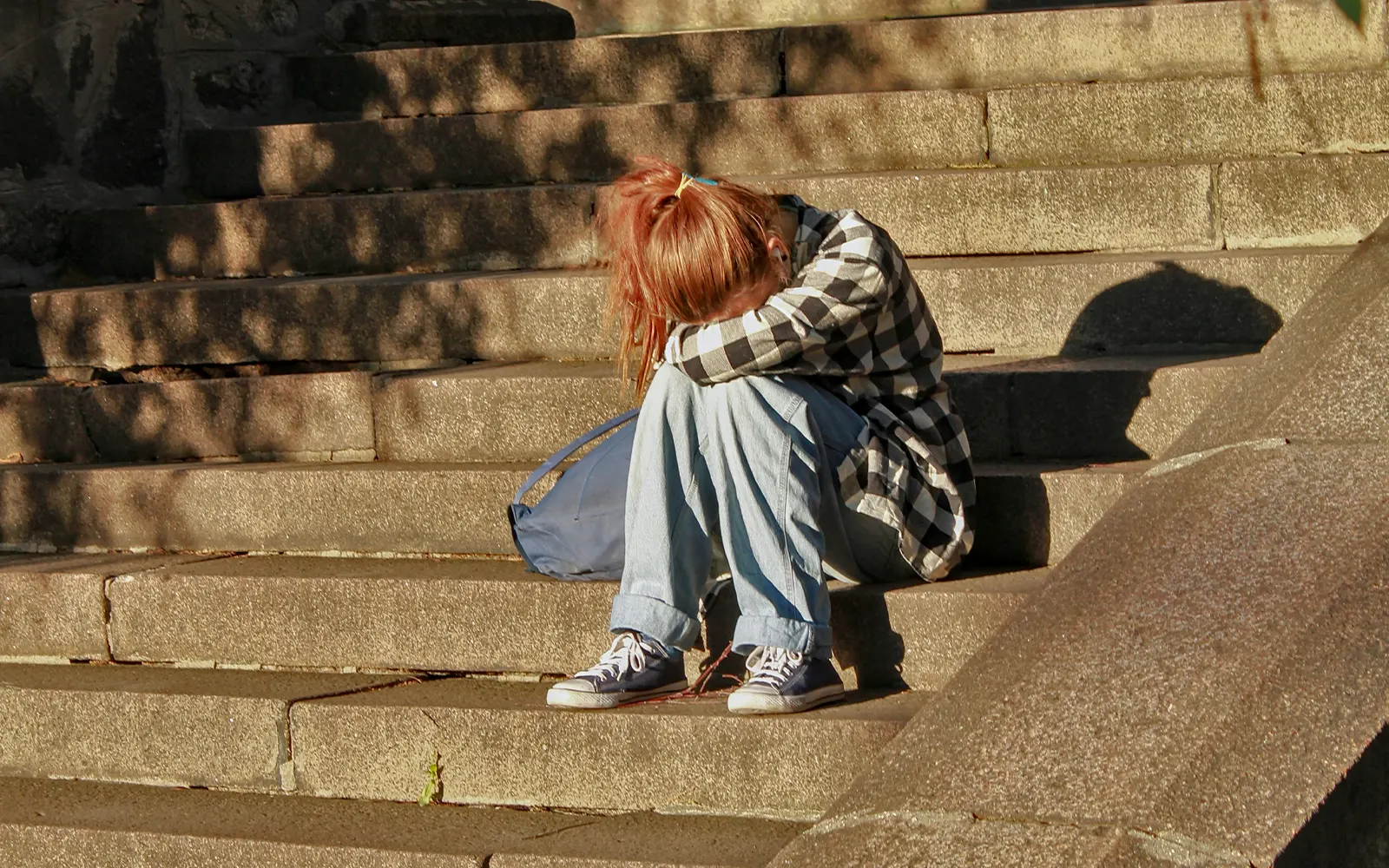 A child grieving from an unexpected loss in her family